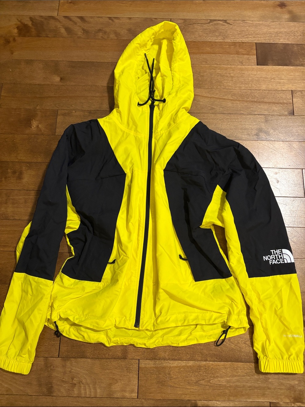 The North Face Yellow and Black Hooded Windfall Shell Jacket